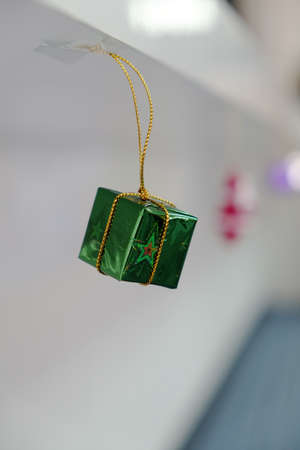 Green box and bow gold ribbon