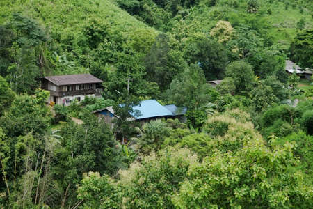village in the middle of forest in Thailandの写真素材
