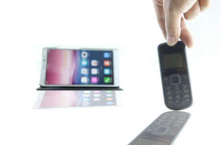 Shadow smart phone and normal phoneの写真素材