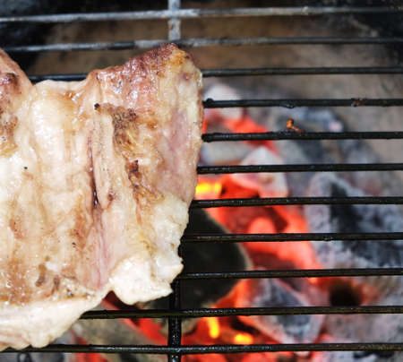 Beef steaks on grill barbecue Fire Grill close-upの写真素材