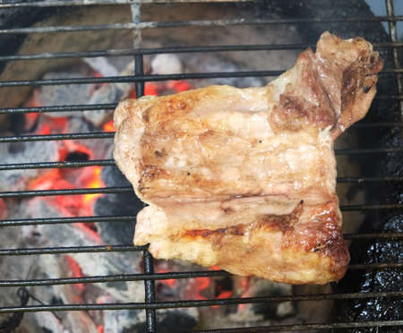 Beef steaks on grill barbecue Fire Grill close-upの写真素材