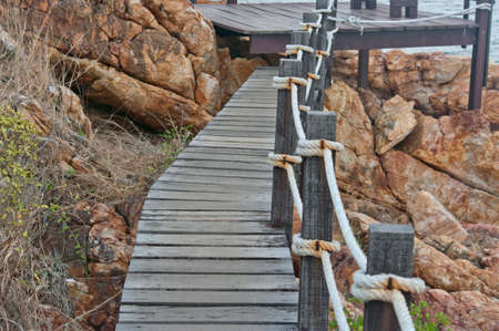 The Wood bridge near seaの写真素材
