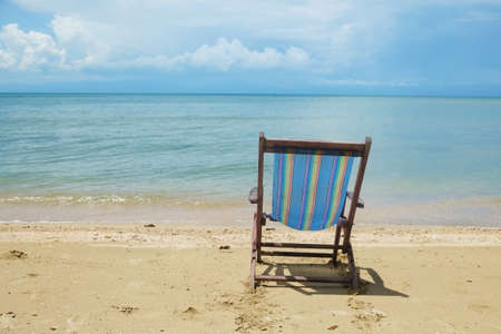 Colorful wooden beach chairの写真素材