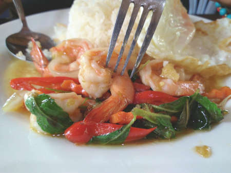 Thai food, shrimp ,with chili pepper and sweet basil, fast food Thailandの写真素材