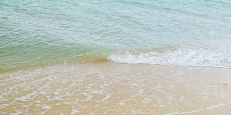 Small wave on the beachの写真素材