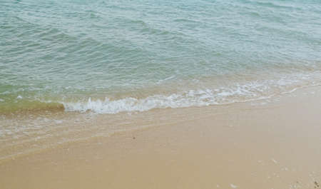Small wave on the beachの写真素材