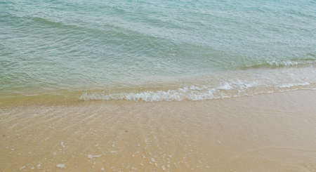 Small wave on the beachの写真素材