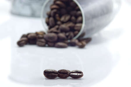 coffee grains in cupの写真素材