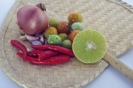 Close up of colorful spices and fresh vegetablesの写真素材