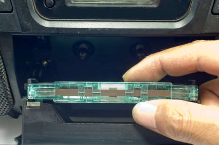 Old cassette tapes and cassette playerの写真素材