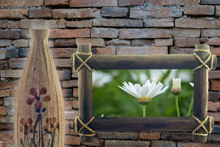 empty vase and photo flower in frameの写真素材