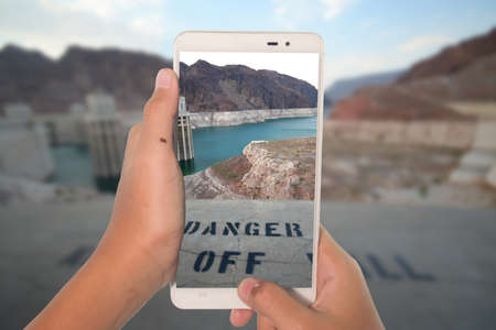 travel concept take photography hoover dam USA by phoneの写真素材