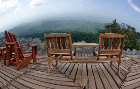 Wooden chair on mountainの写真素材