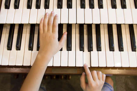 little boy to play the pianoの写真素材