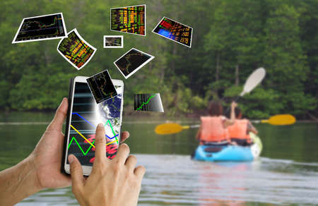 travel and working stock by smartphoneの写真素材