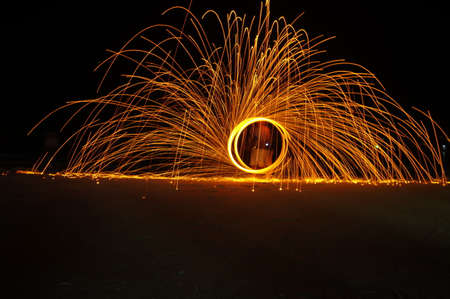 Amazing Fire Show at night on samet Island, Thailandの写真素材