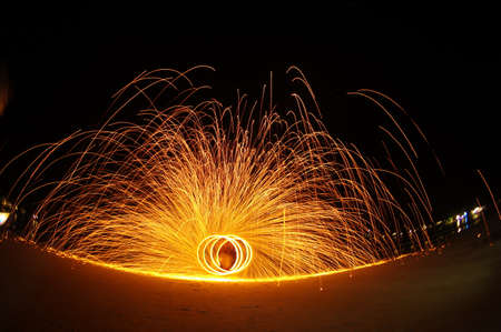 Amazing Fire Show at night on samet Island, Thailandの写真素材