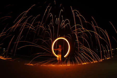 Amazing Fire Show at night on samet Island, Thailandの写真素材