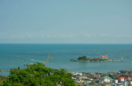 Temple on island against blue sky and sea, Thailand sriracha chonburiの写真素材