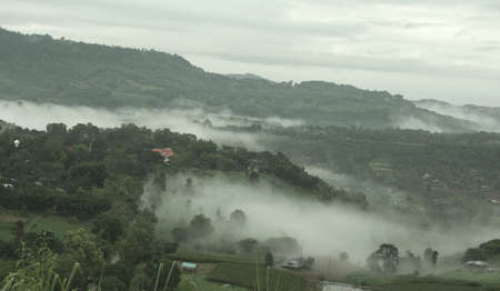 misty mountains in the distanceの写真素材