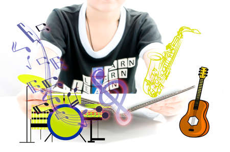 Boy learning for new experience with musical equipment for begin playの写真素材