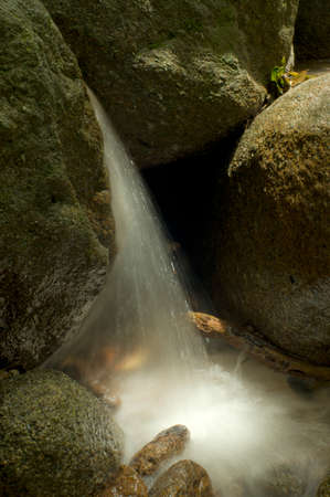 Abstract waterfall from ravineの写真素材