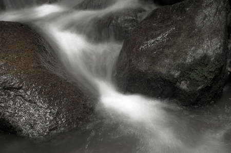 Abstract waterfall from ravineの写真素材