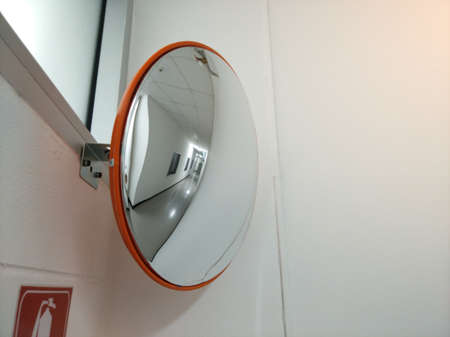 Convex mirror for junction walk way can not seeの写真素材