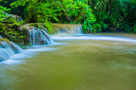Waterfall in deep forest at Huay Mae Kamin National Park, Kanchanaburi, Thailandの写真素材