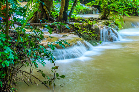 Waterfall in deep forest at Huay Mae Kamin National Park, Kanchanaburi, Thailandの写真素材