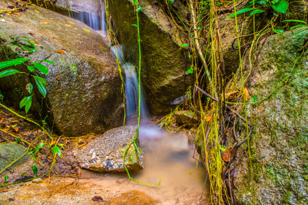 Water Flowing in Tad Mok waterfall, Thailand. Natural background.の写真素材