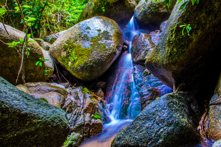 Water Flowing at Maesa Noi Waterfall, Thailand.の写真素材
