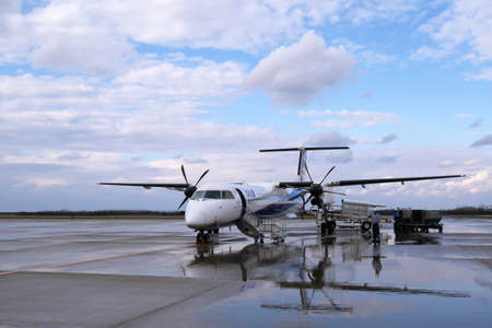 NARITA, JAPAN - Oct 31, 2015: All Nippon Airways small commercial airplane docked in Niigata Airport.のeditorial素材