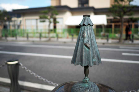 SAKAIMINATO, JAPAN - Novermber 26, 2015: Bronze statues of 'GeGeGe no Kitaro' Main character on Mizuki Shigeru road, Sakaiminato, Tottori.のeditorial素材