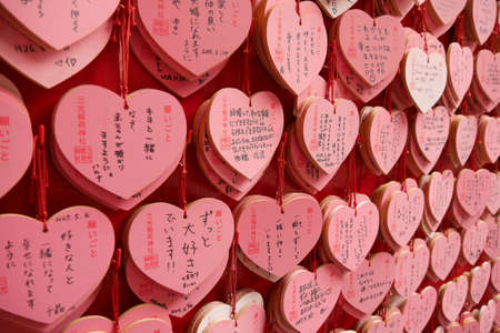 Inuyama, JAPAN - Jun 16th, 2015. Ema are small wooden plaques on which Shinto worshippers write their prayers or wishes. Ema are then left hanging up at the shrine for gods or spirits to receive themのeditorial素材