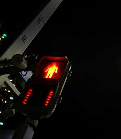 Pedestrian sign, the red signal at junction night timeの写真素材