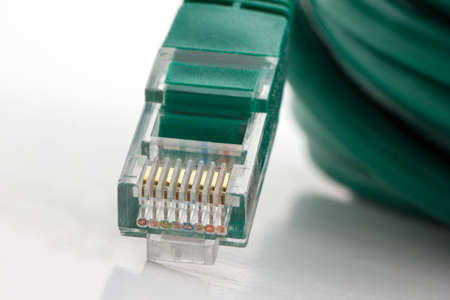 Coil of green CAT-5 network cable 