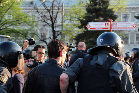 Police arresting an opposition representative during his speech in Moscow, May 2012のeditorial素材