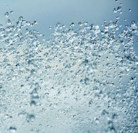 Flow of water with lots of individual drops visible  shot at really high shutter speed の写真素材
