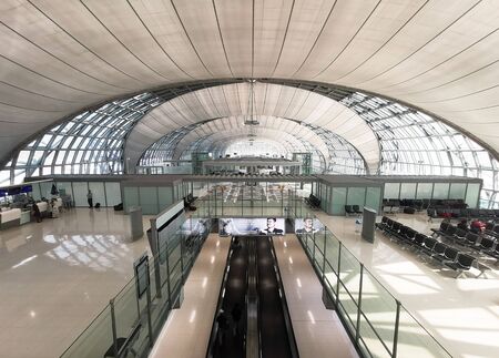 Bangkok, Thailand - January 19 , 2019 : Flight attendants entering departure terminal of Suvarnabhumi Airport interior designのeditorial素材
