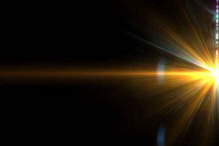 Abstract lens flare light over black backgroundの写真素材