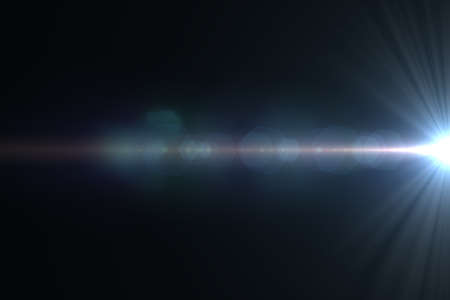 Abstract lens flare light over black background