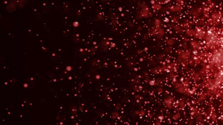 Stardust gold bokeh on black background with and flare. Glitter gold bokeh flare on black. Stardust...