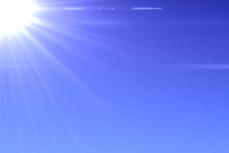 Sun burst and blue skyの写真素材