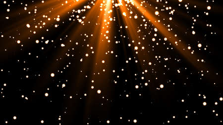 Sprinkle gold dust on a black background with copy space.