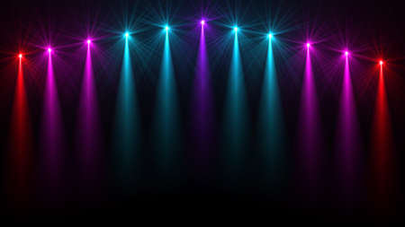 Stage lights. Several projectors in the dark. Purple spotlight strike through the darkness
