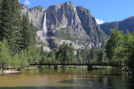 Yosemite waterfall and swinging bridgeの写真素材