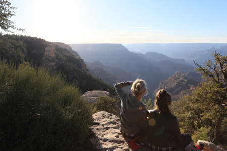 Relaxing and viewing at Grand canyonの写真素材