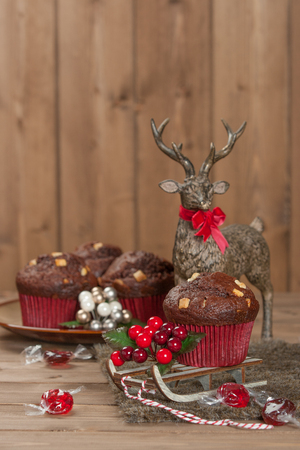 Chocolate Muffins With White Chocolate Chips. Mug Of Tea Or Coffee. Christmas Decorationsの写真素材