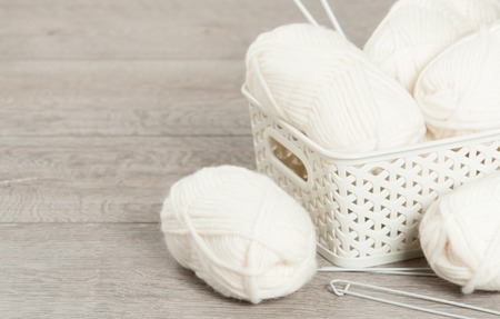 Natural Wool Yarn Balls. Knitting Needles